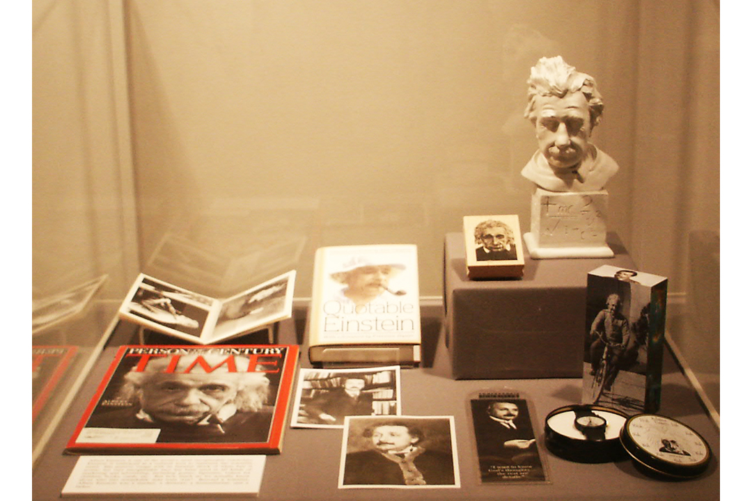 Magazines, books, and a bust showing Albert Einstein on display