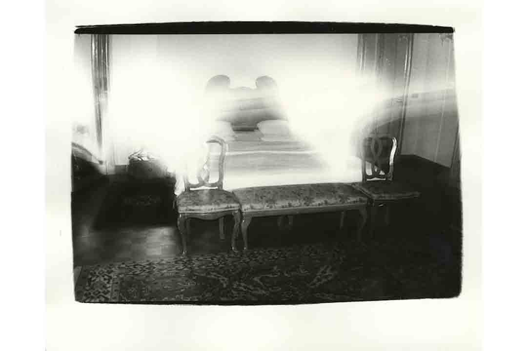 image of a bed in a room; link opens in new window